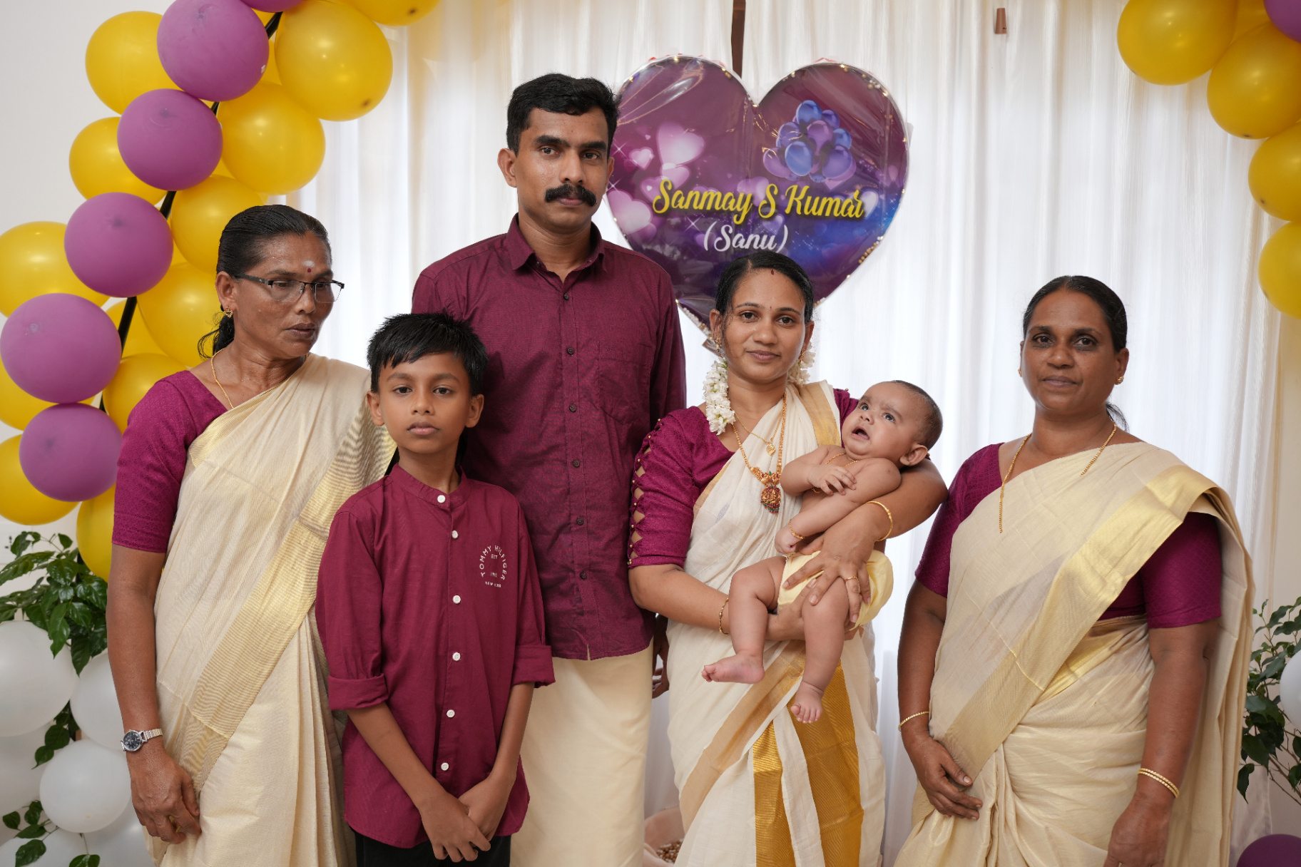 Family with grandmothers at the ceremony